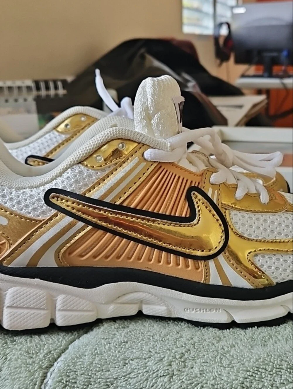 Nike Women's White and Gold Athletic Sneakers